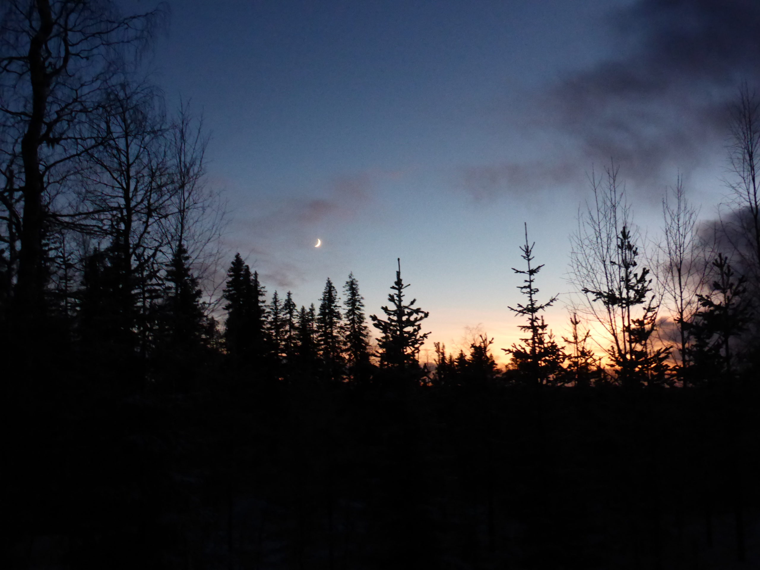 Moon and Sunset in Lapland Sweden