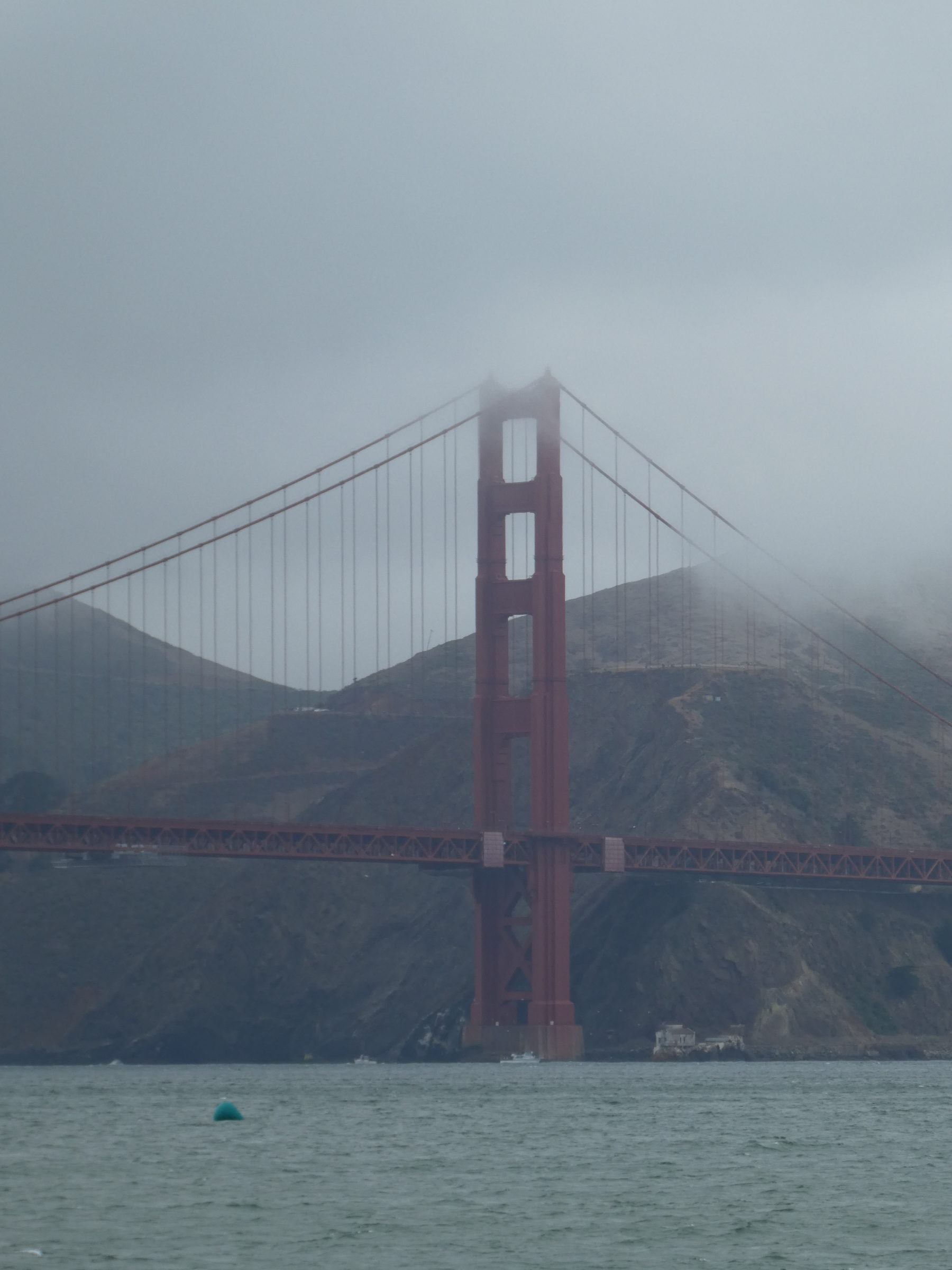 Golden Gate Bridge in fog in San Francisco by hesaidorshesaid