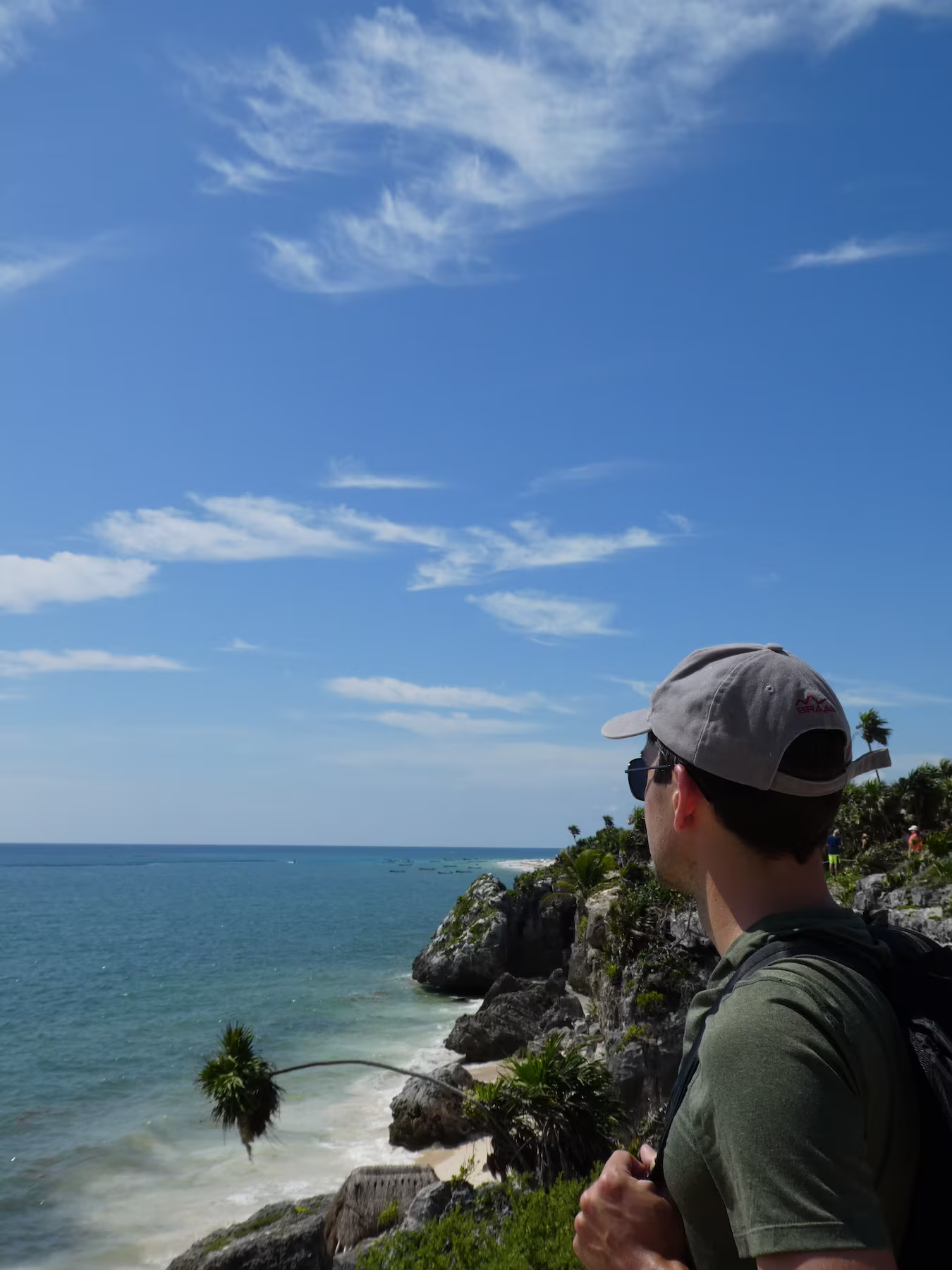 Ryne looking at the ocean from Tulum Archaeological Site