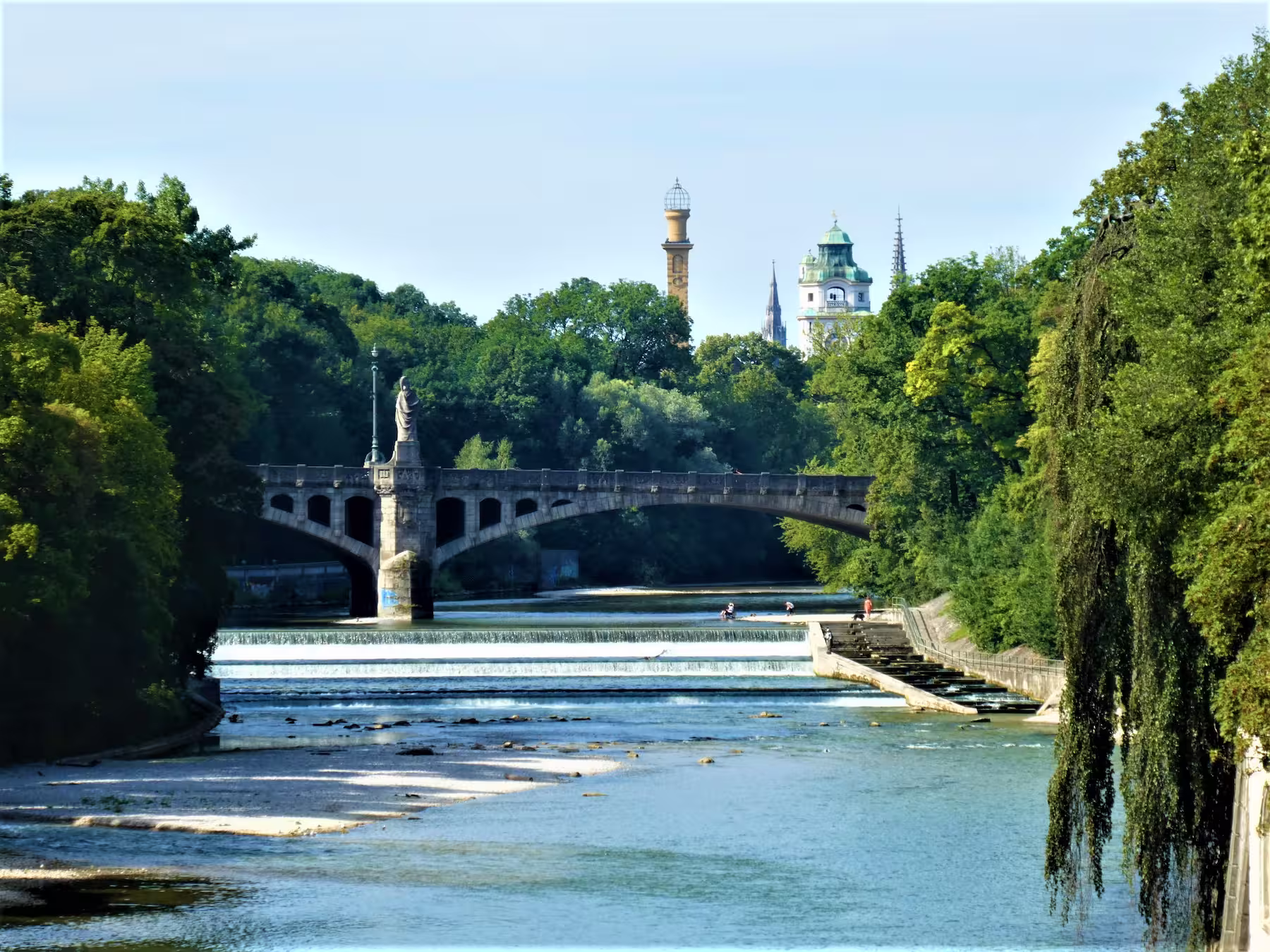 Bridge and small waterfall, Isar River in Munich