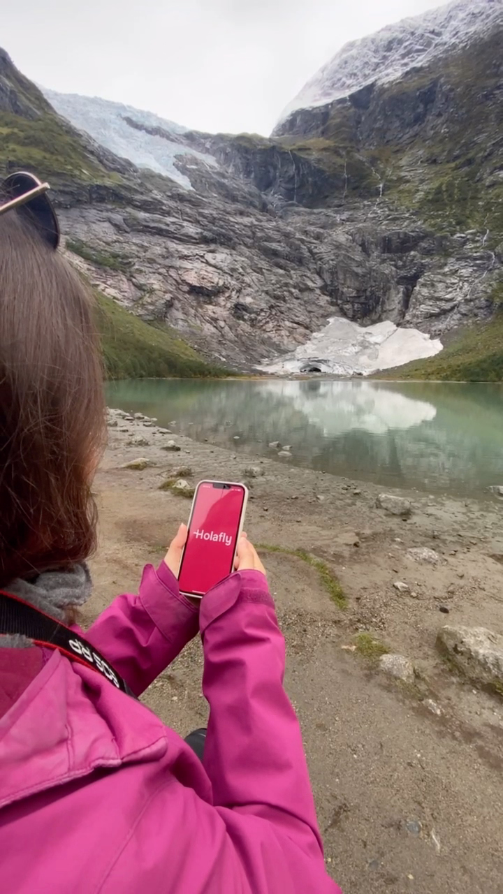 Denise using the Holafly app at a remote lake in Norway